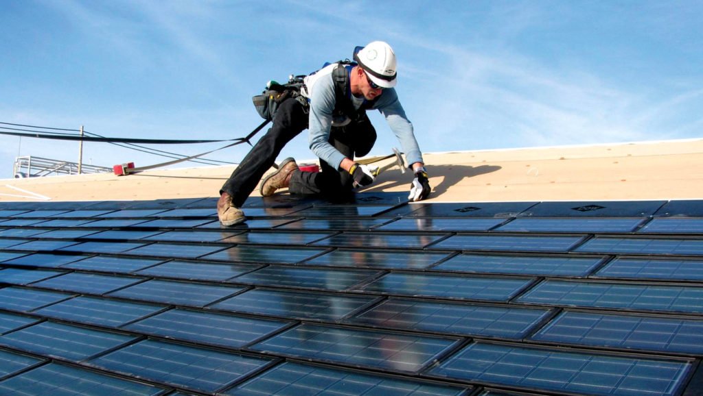 Installer-Working-On-Roof-Tiles