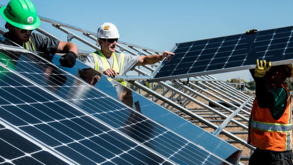 Person-Installing-Solar-Panels