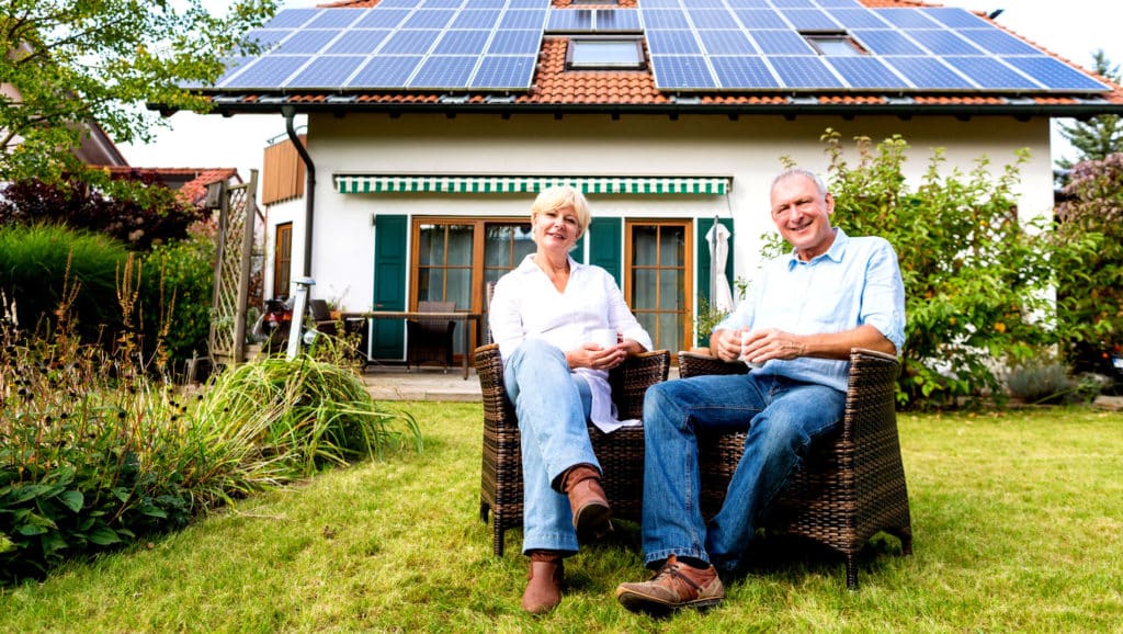 A-Couple-Sitting-In-The-Garden