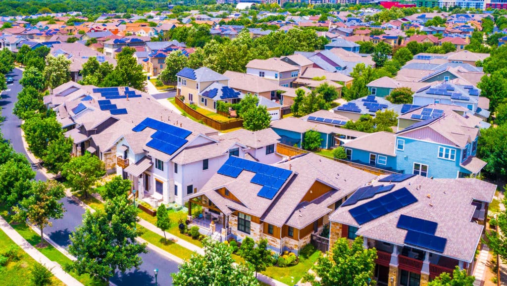 Houses-With-Solar-Panels-On-The-Roof